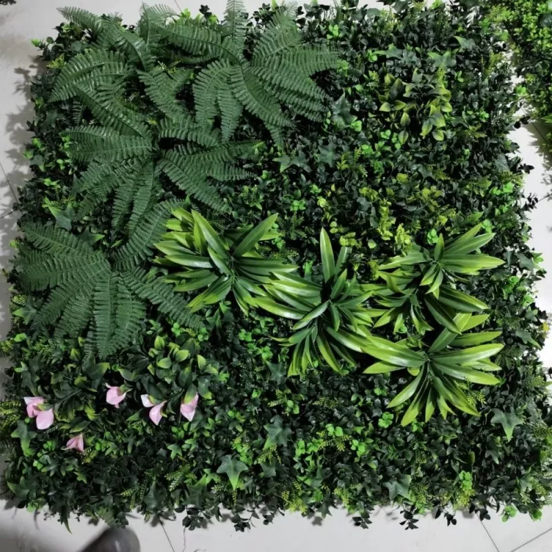 Custom faux green wall with mixed foliage