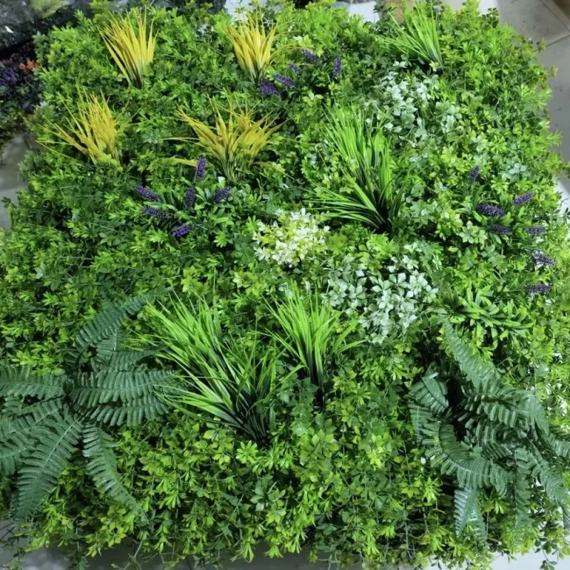 Vertical synthetic greenery wall with tropical plants
